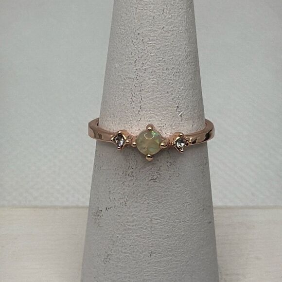 Brand New!! Size 7 ring with faux opal center stone and two flanking zircon ston - Picture 1 of 4